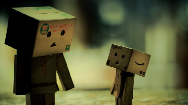 Two cardboard box figures