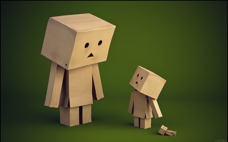 Two cardboard figures standing