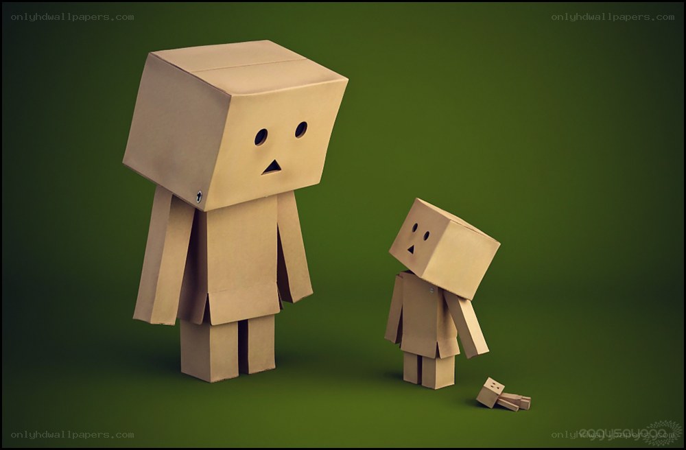 Two cardboard figures standing