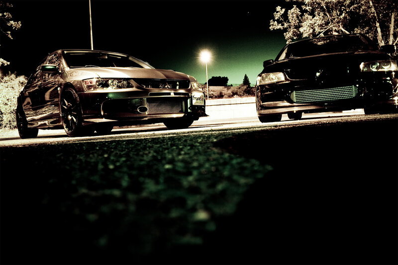 Two cars at night