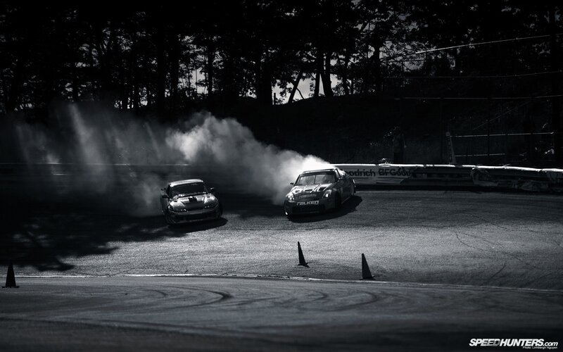Two cars drifting on a track