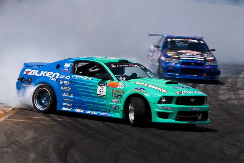 Two cars drifting on a track