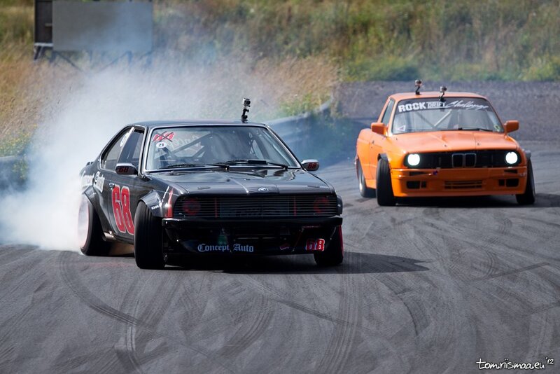 Two cars drifting on a track