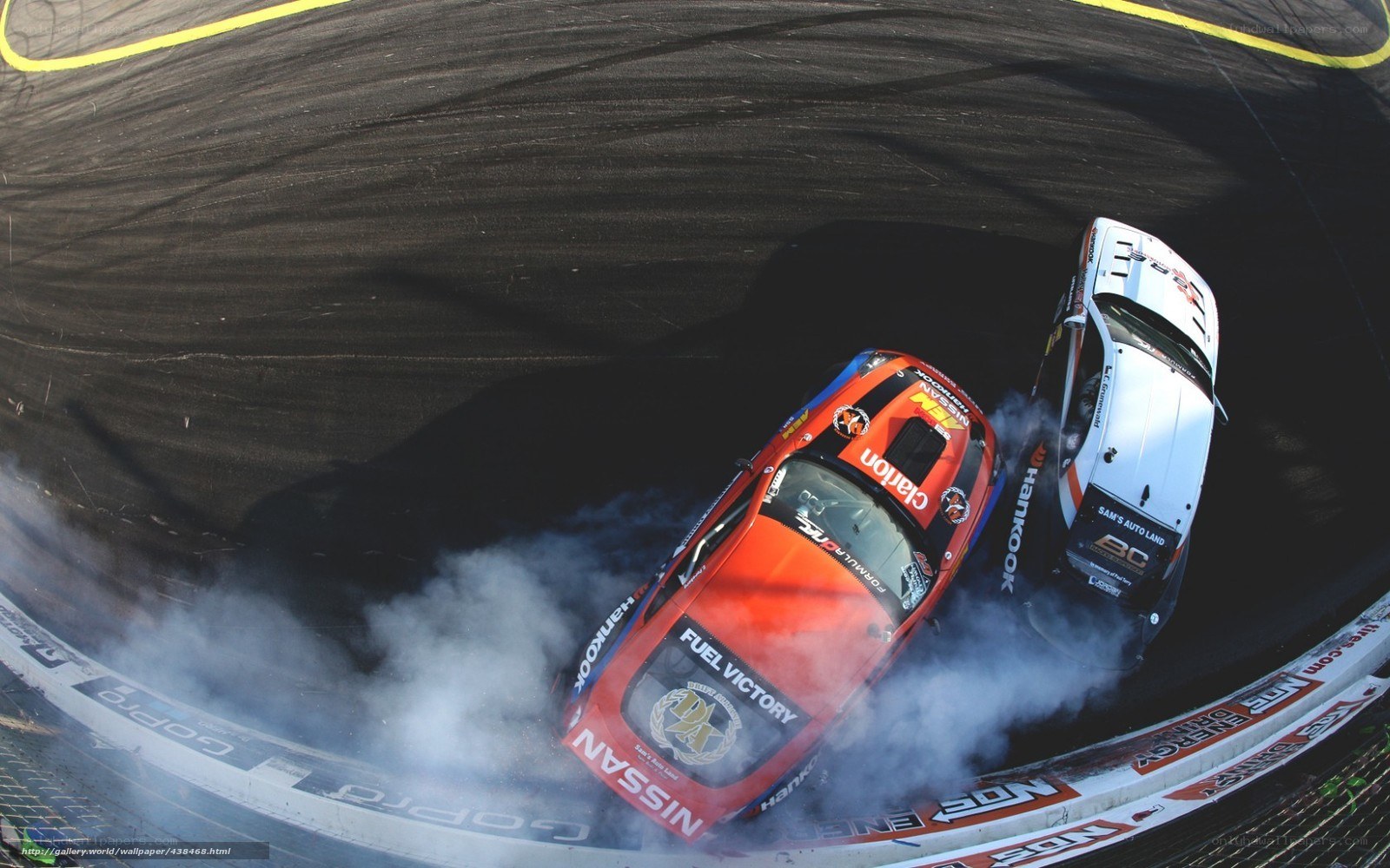 Two cars drifting on a track