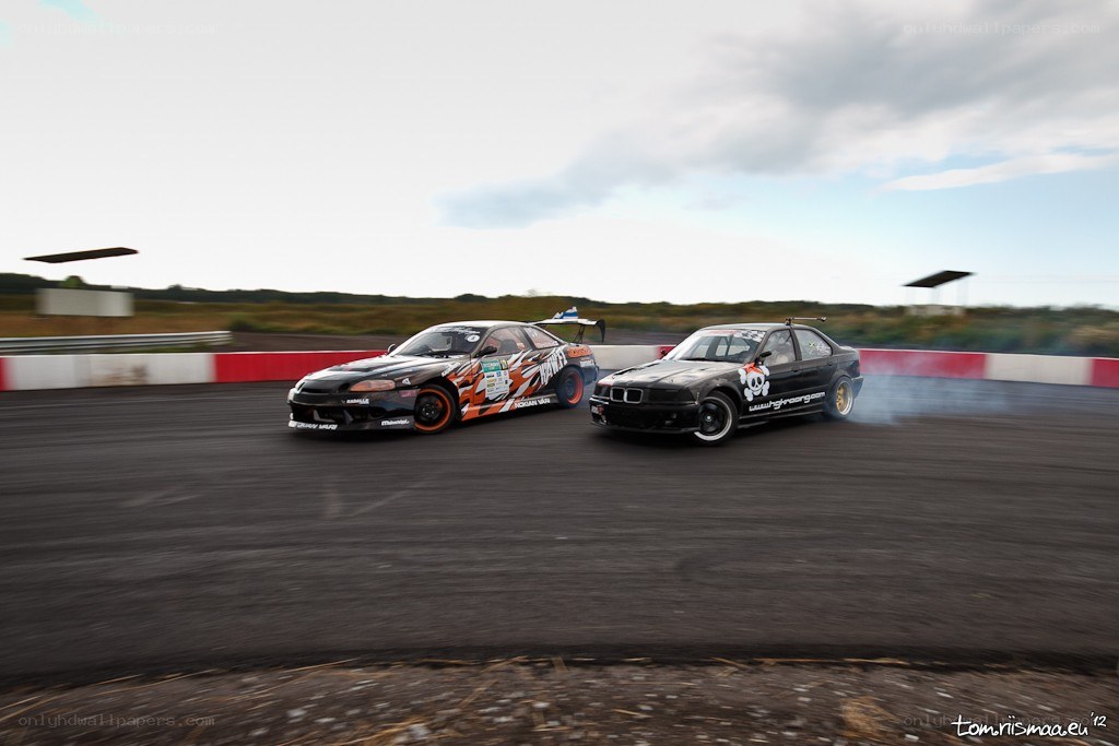 Two cars drifting on a track