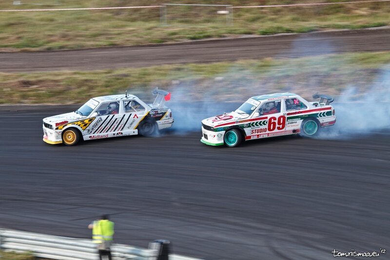 Two cars drifting on a track