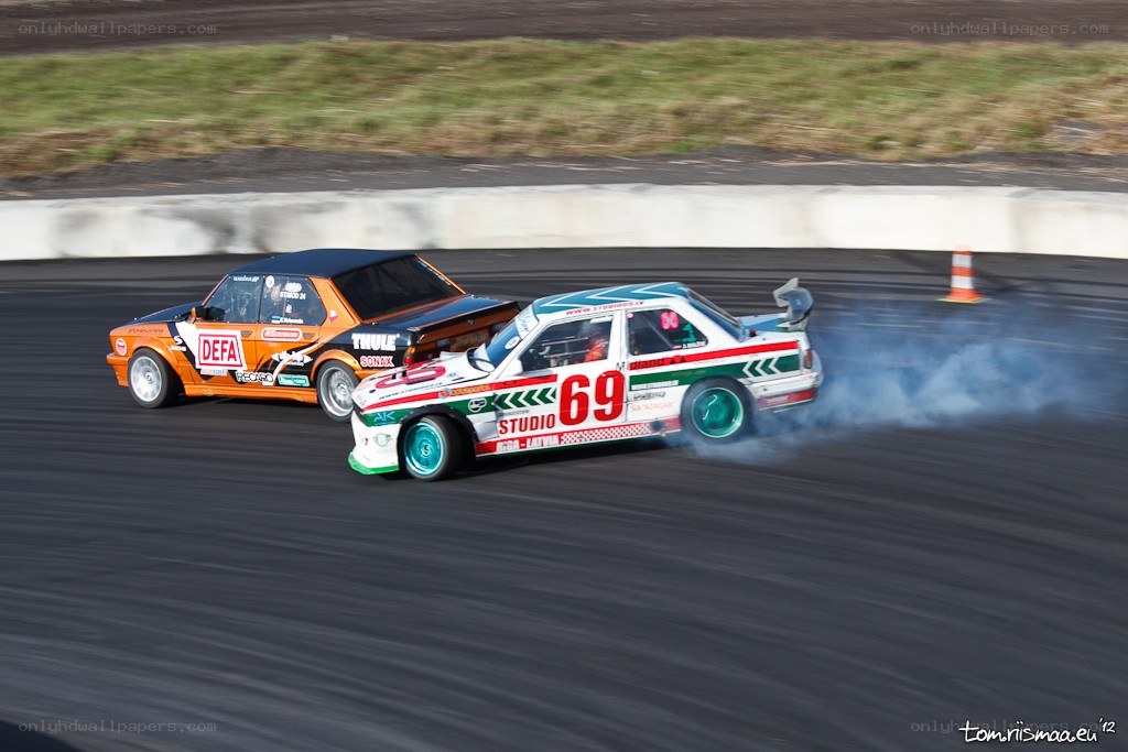 Two cars drifting on a track