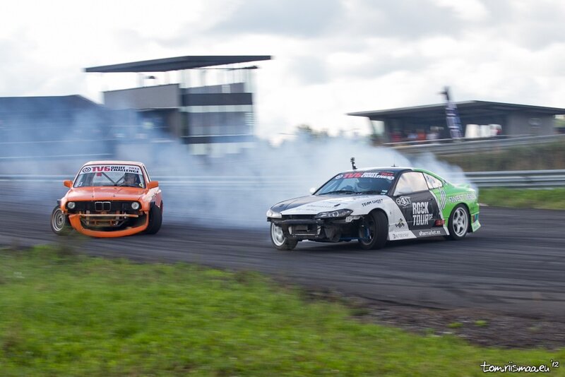 Two cars drifting on a track