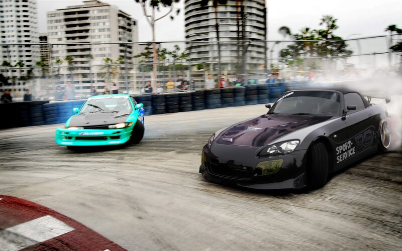 Two cars drifting on a track