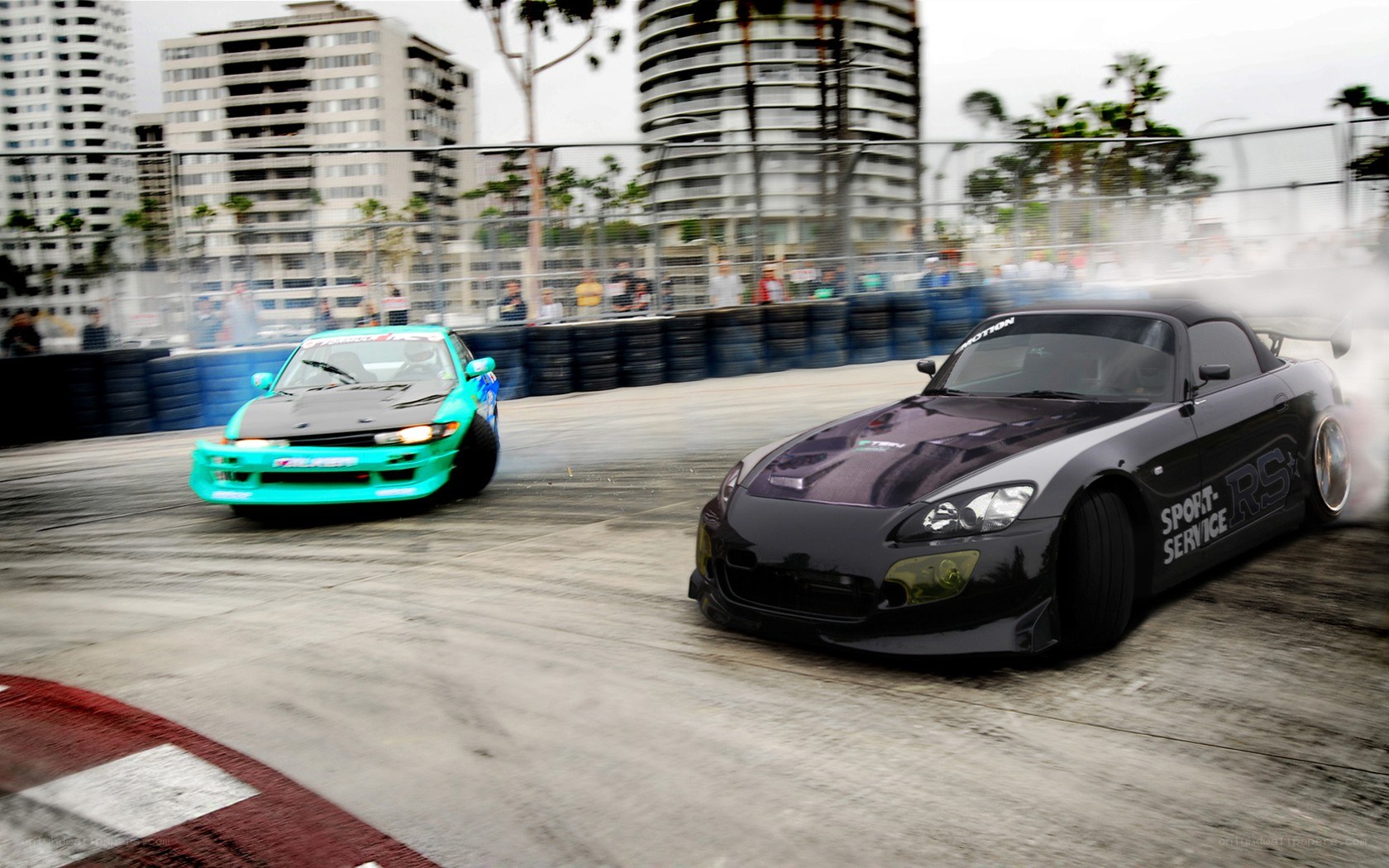 Two cars drifting on a track