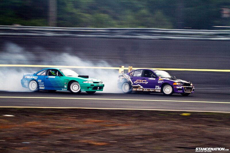 Two cars drifting on a track