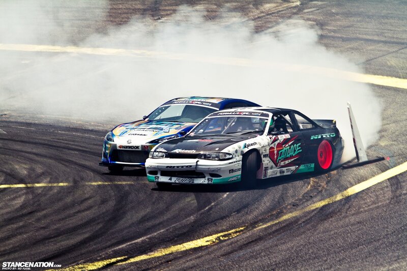 Two cars drifting on a track