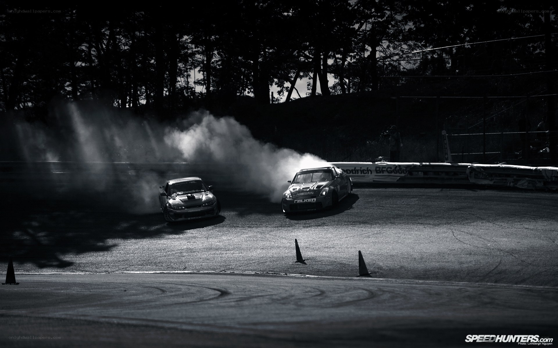 Two cars drifting on a track