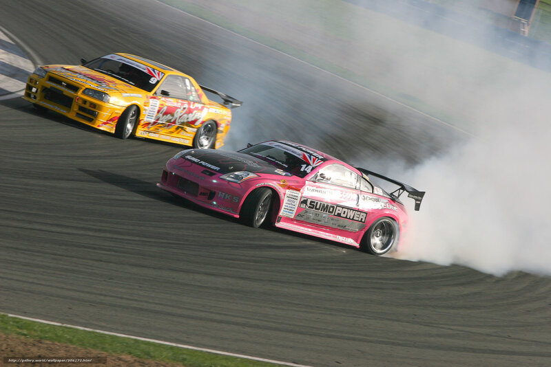 Two cars drifting on a track
