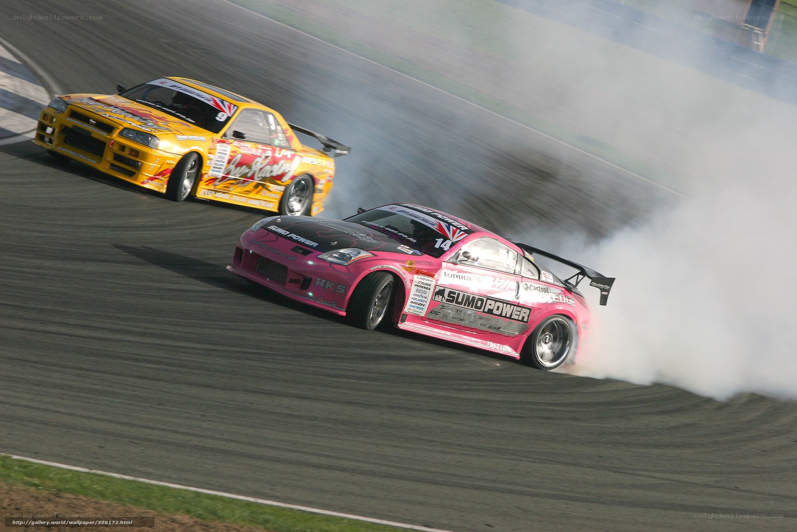 Two cars drifting on a track