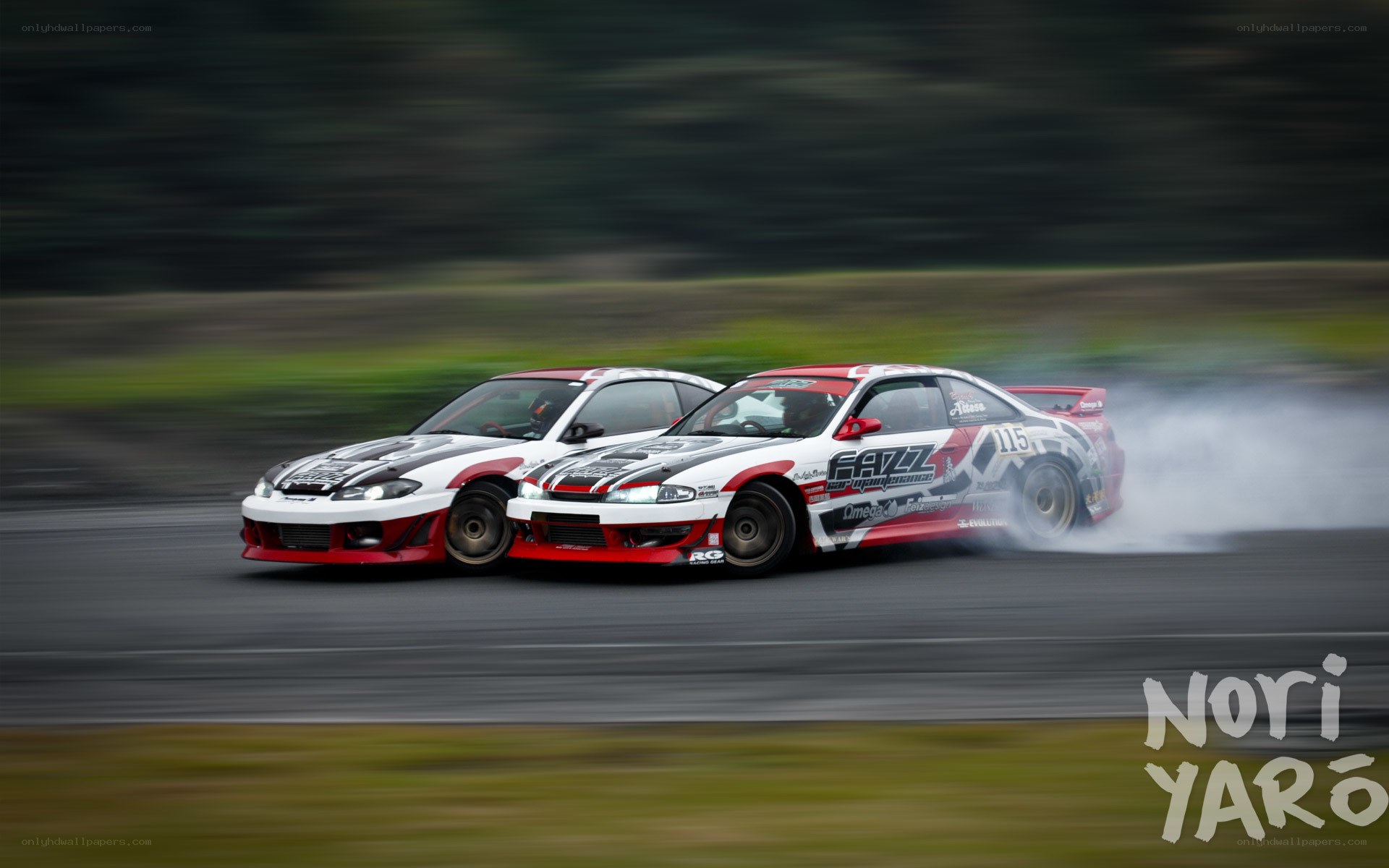 Two cars drifting on track