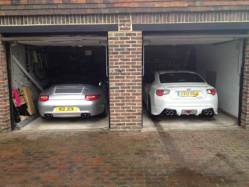 Two cars in a garage