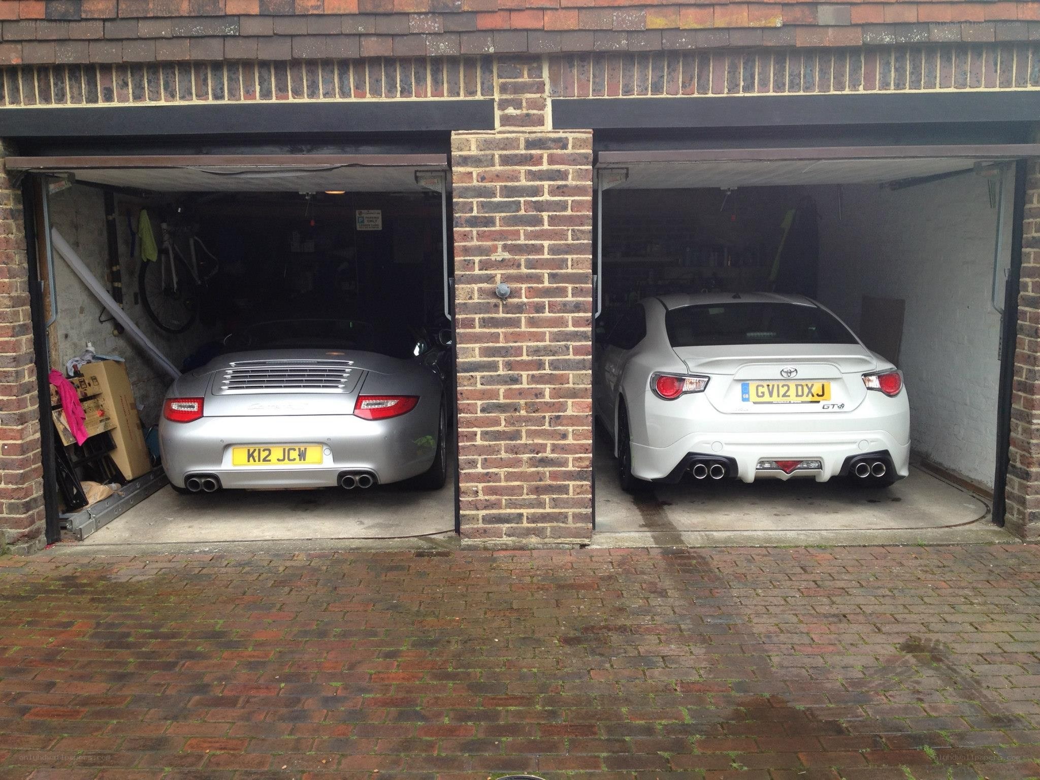 Two cars in a garage