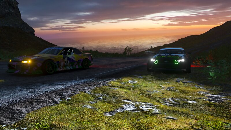 Two Cars on a Coastal Road
