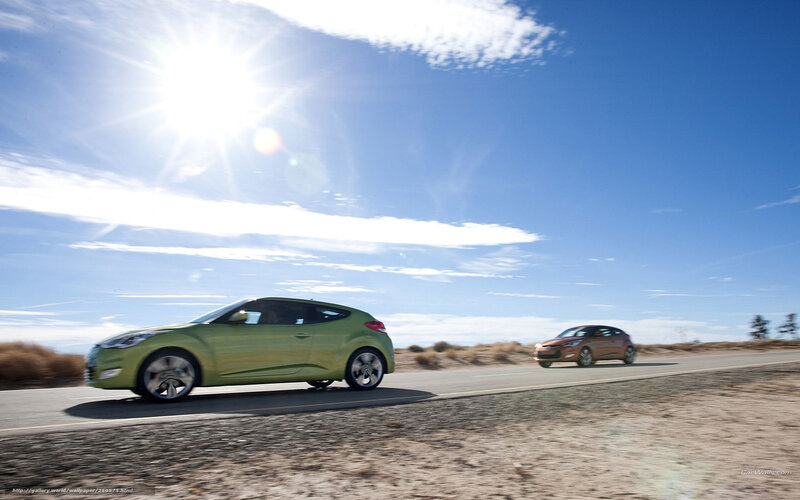 Two cars on a sunny road