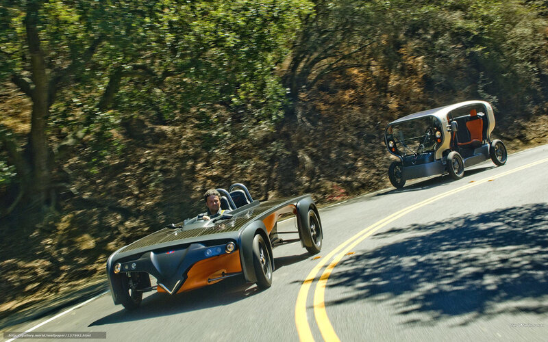 Two cars on a winding road