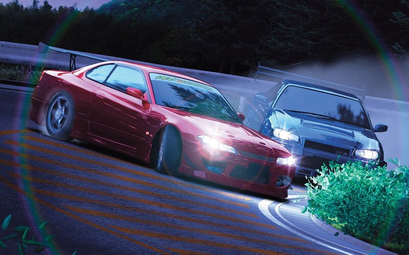 Two cars racing on a road