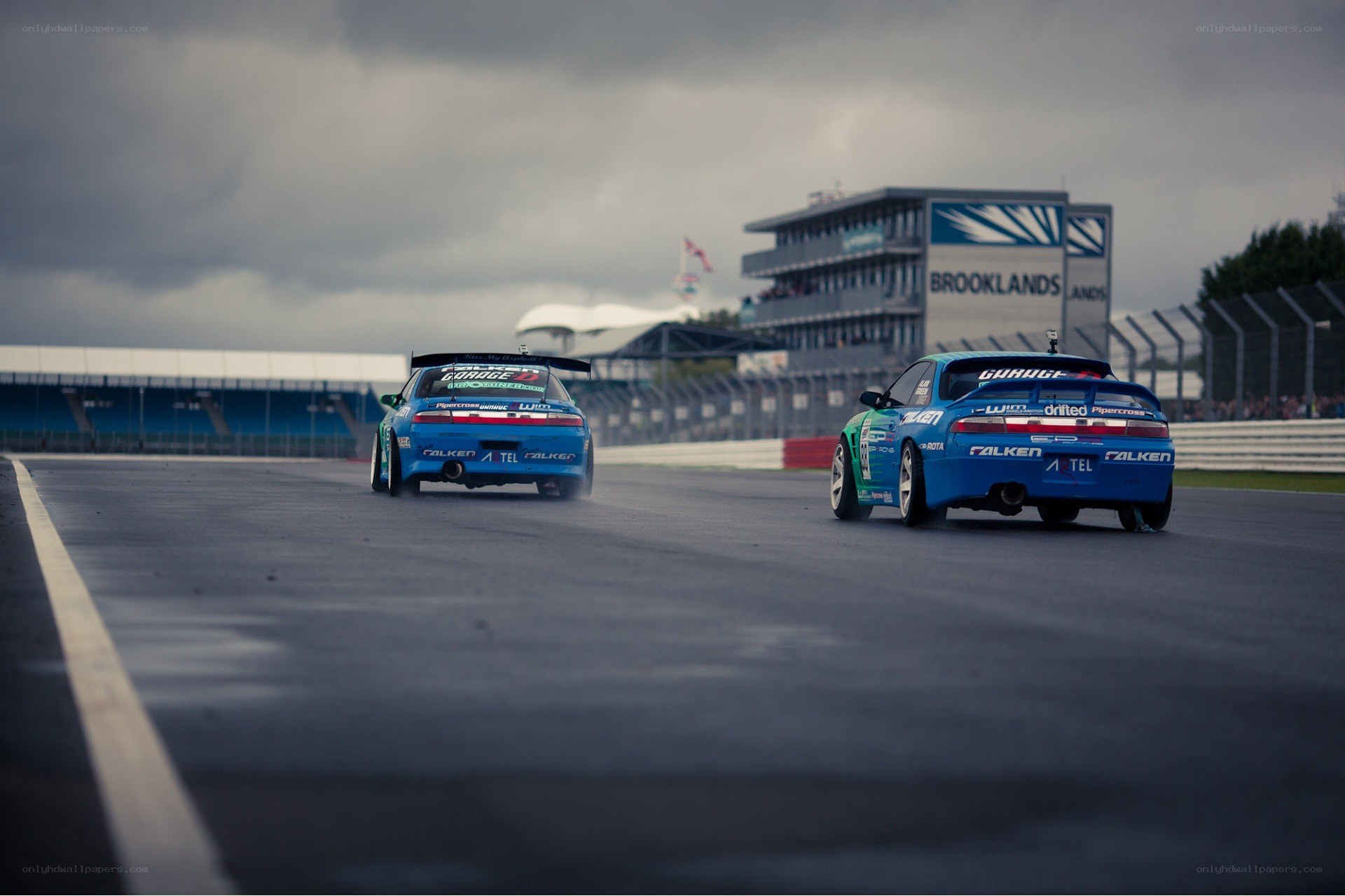Two cars racing on a track