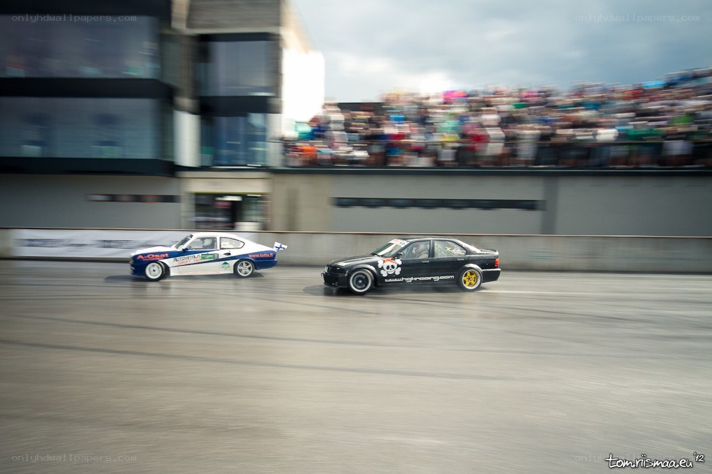 Two cars racing on a track