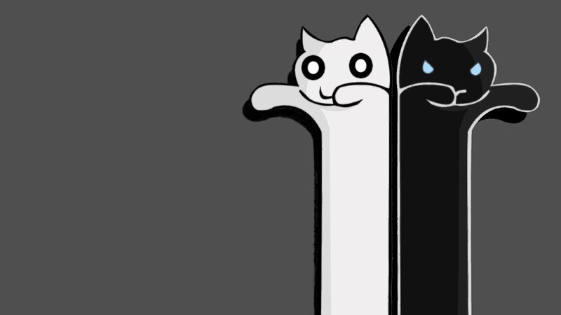 two cats peeking from behind