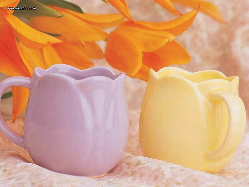 Two Ceramic Pitchers