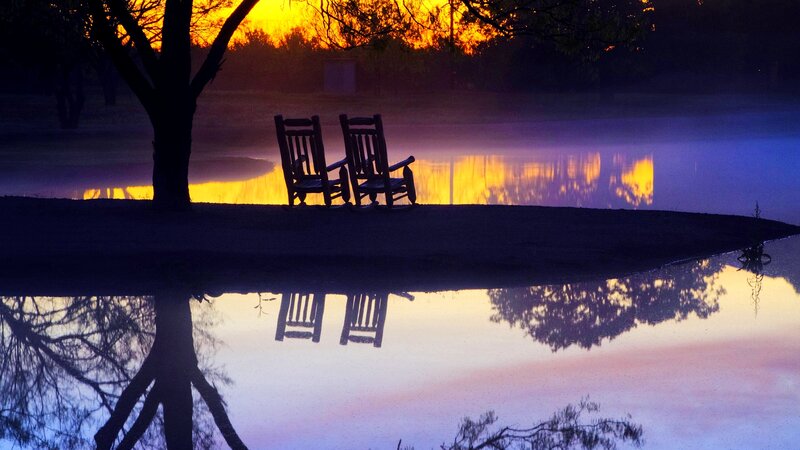 Two Chairs by Lake