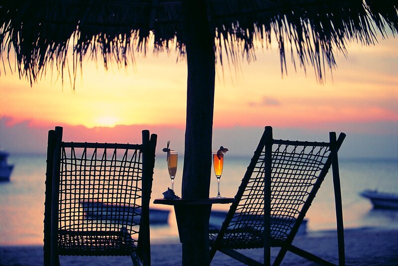Two Chairs under Umbrella