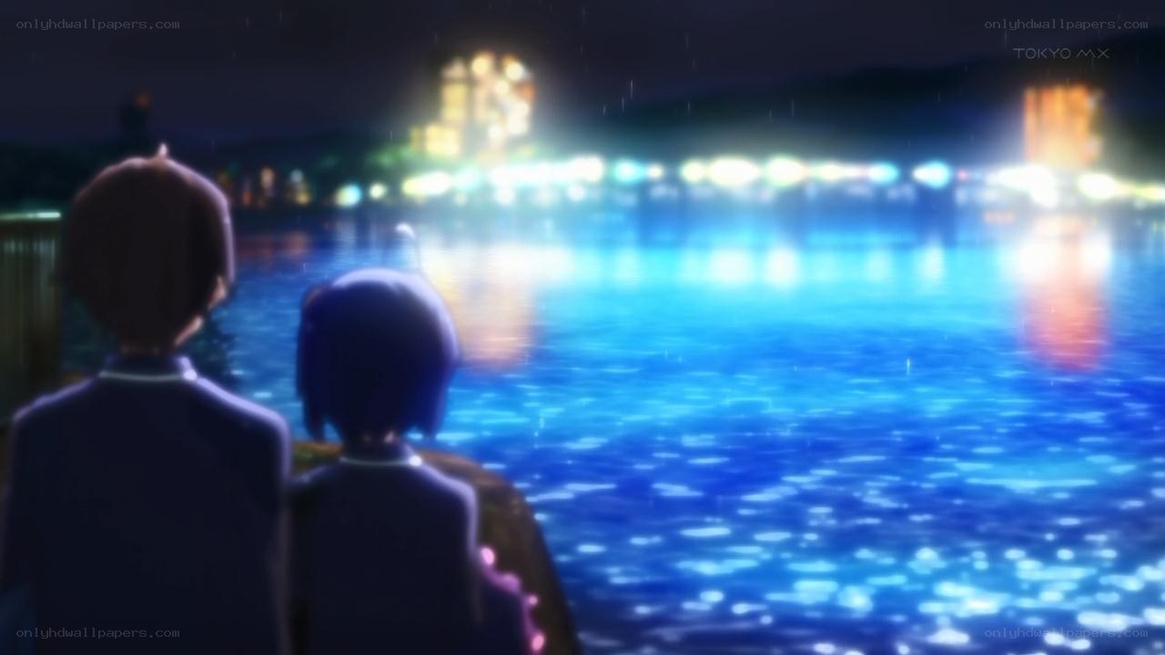 two characters at night by the water
