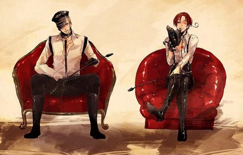 Two Characters in Red Chairs