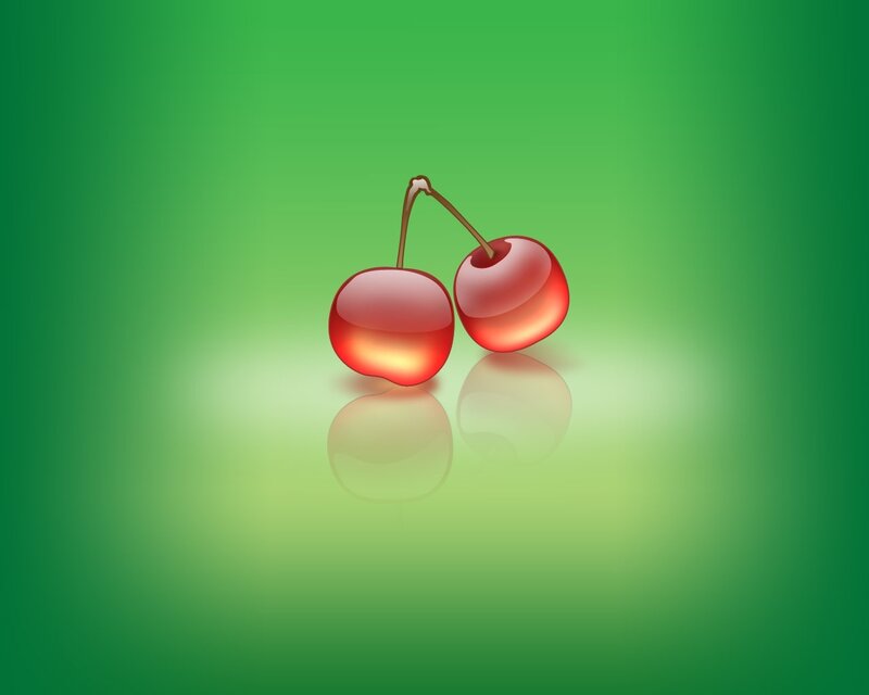 two cherries on green