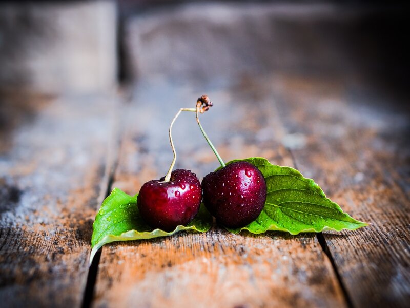 Two Cherries on Leaf — Red