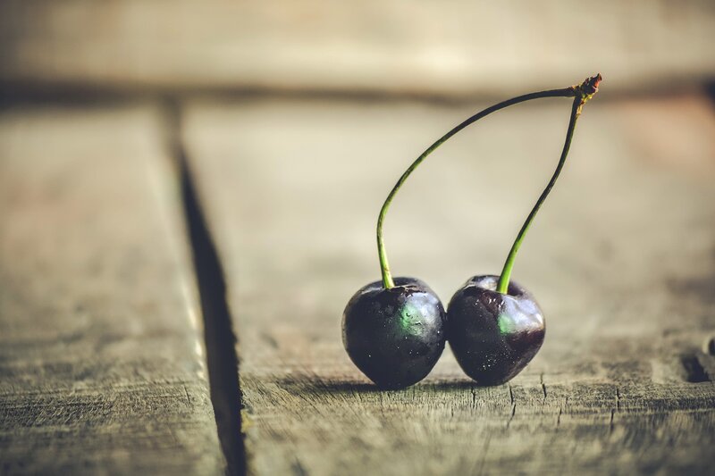 Two Cherries on Wood — Black