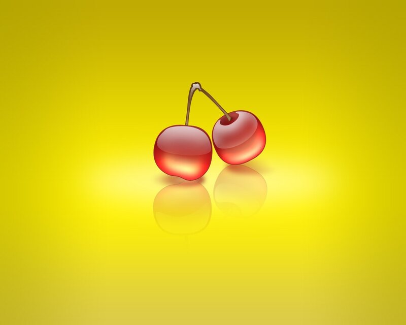 two cherries on yellow