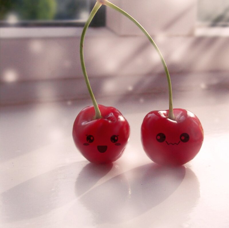 Two Cherries with Faces