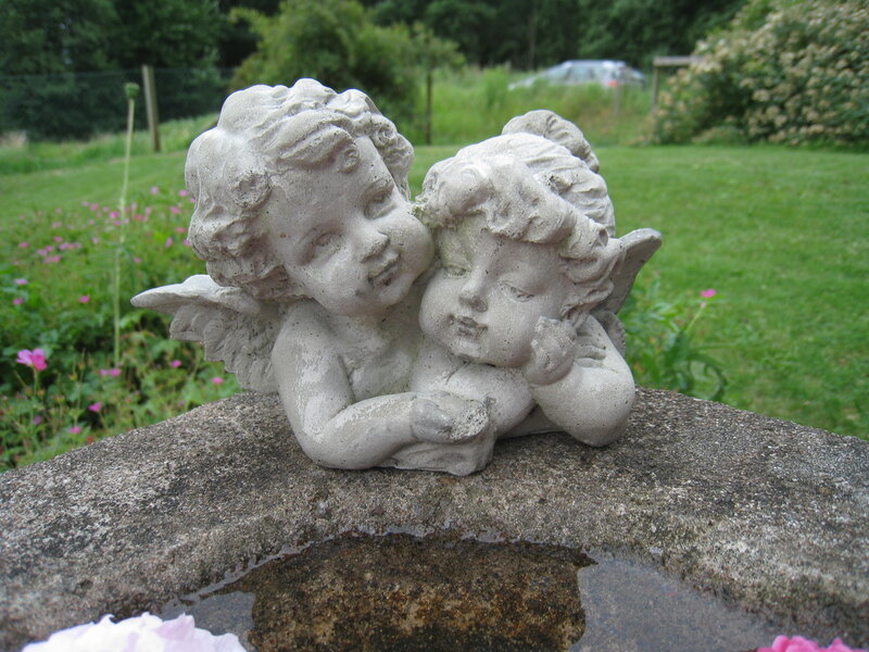 Two Cherub Statues — Gray