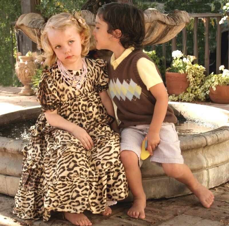 Two Children by Fountain