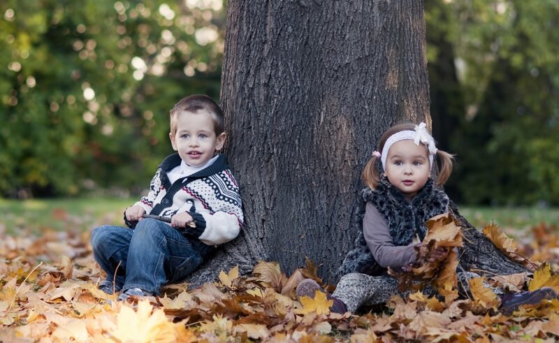 Two Children by Tree