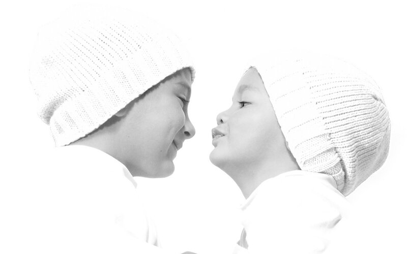 Two Children Facing Each Other