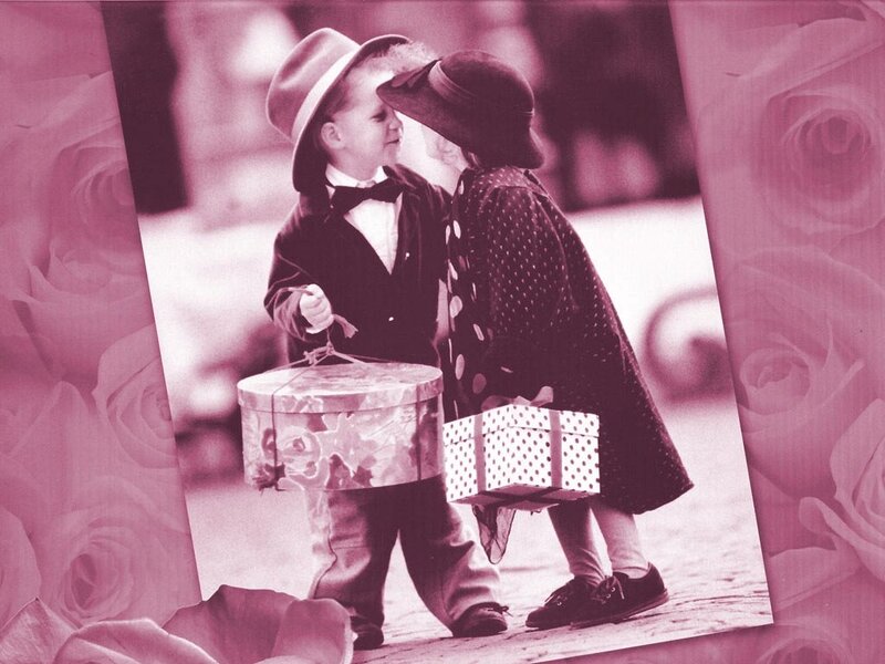 Two Children Holding Gifts