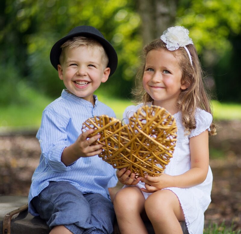 Two Children Holding Heart — Green