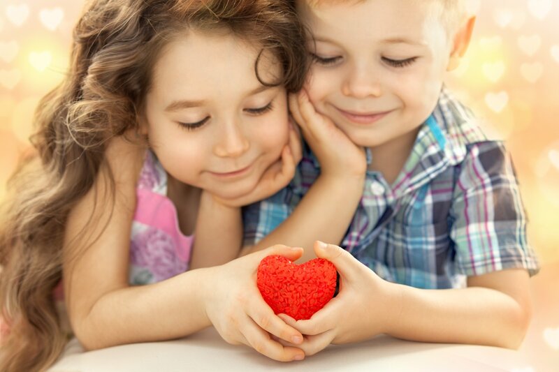 Two Children Holding Heart