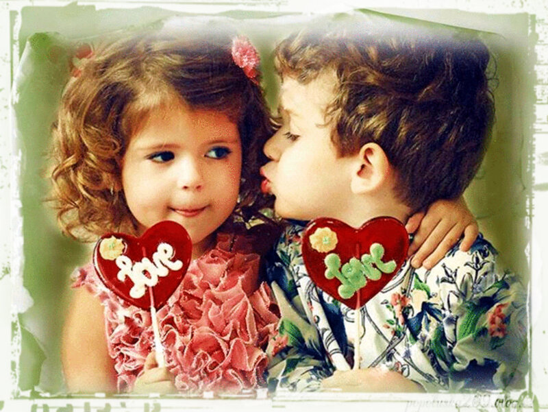 Two Children Holding Lollipops