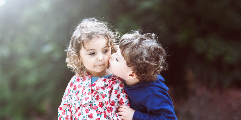 Two Children Hugging — Blue, Tender