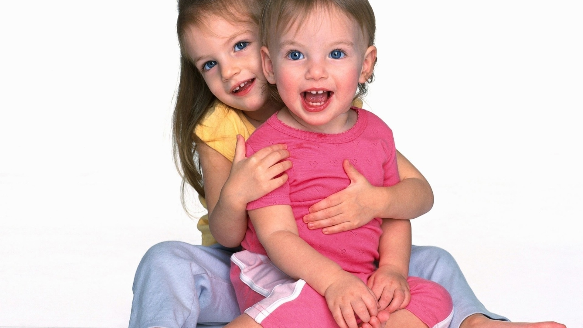 two children hugging
