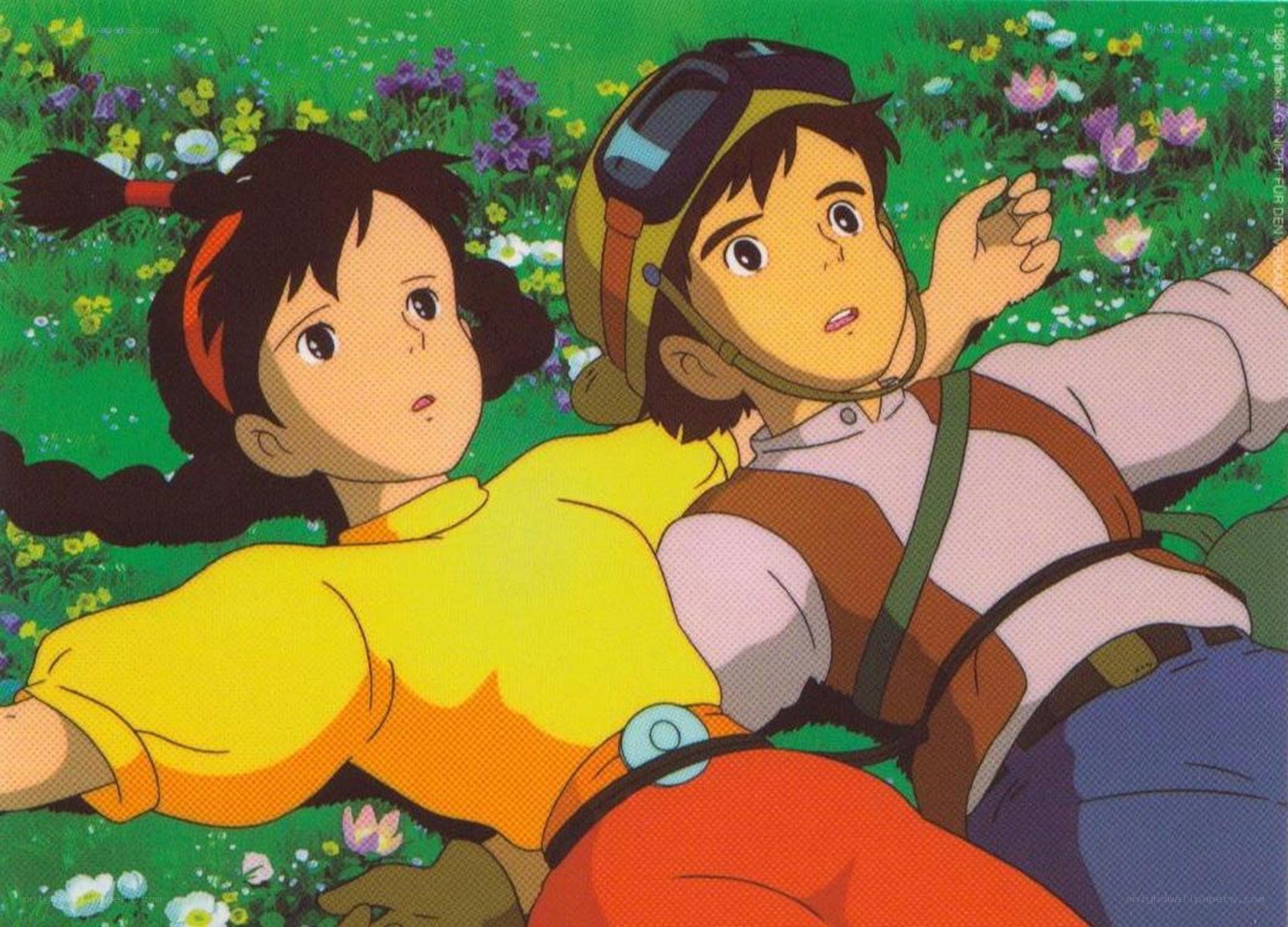 Two children in a flower field